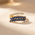 Gold-Tone Bypass Ring with Navy Marquise Leaf Spray