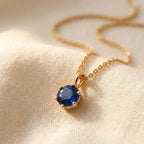 Gold-Tone Six-Prong Round Blue Solitaire Pendant