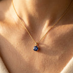 Gold-Tone Six-Prong Round Blue Solitaire Pendant