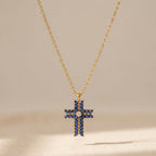 Gold-Tone Cross Pendant Necklace with Navy Marquise Stones
