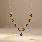 Gold-Tone Leaf Vine Necklace with Blue Stones and Pear Drop