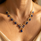 Gold-Tone Leaf Vine Necklace with Blue Stones and Pear Drop