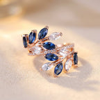 Rose Gold-Tone Bypass Ring with Blue and Clear Marquise Leaves