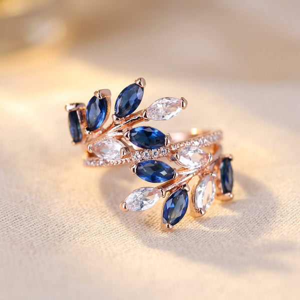 Rose Gold-Tone Bypass Ring with Blue and Clear Marquise Leaves