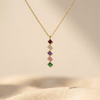 Gold-Tone Zigzag Bar Pendant with Square Colour Stones
