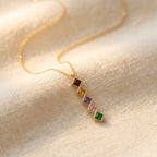 Gold-Tone Zigzag Bar Pendant with Square Colour Stones