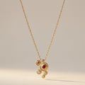 Gold-Tone Cluster Pendant Necklace with Red and Clear Stones