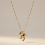 Gold-Tone Cluster Pendant Necklace with Red and Clear Stones