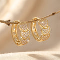 Gold-Tone Triple Heart Pavé Huggie Hoop Earrings