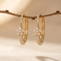 Gold-Tone Flower Charm Huggie Hoops with Clear Stones
