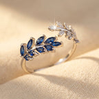 Silver-Tone Bypass Ring with Blue Marquise Leaf Spray