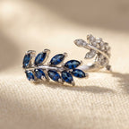 Silver-Tone Bypass Ring with Blue Marquise Leaf Spray