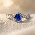 Silver-Tone Swirl Bypass Ring with Round Blue Stone