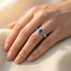 Silver-Tone Swirl Bypass Ring with Round Blue Stone